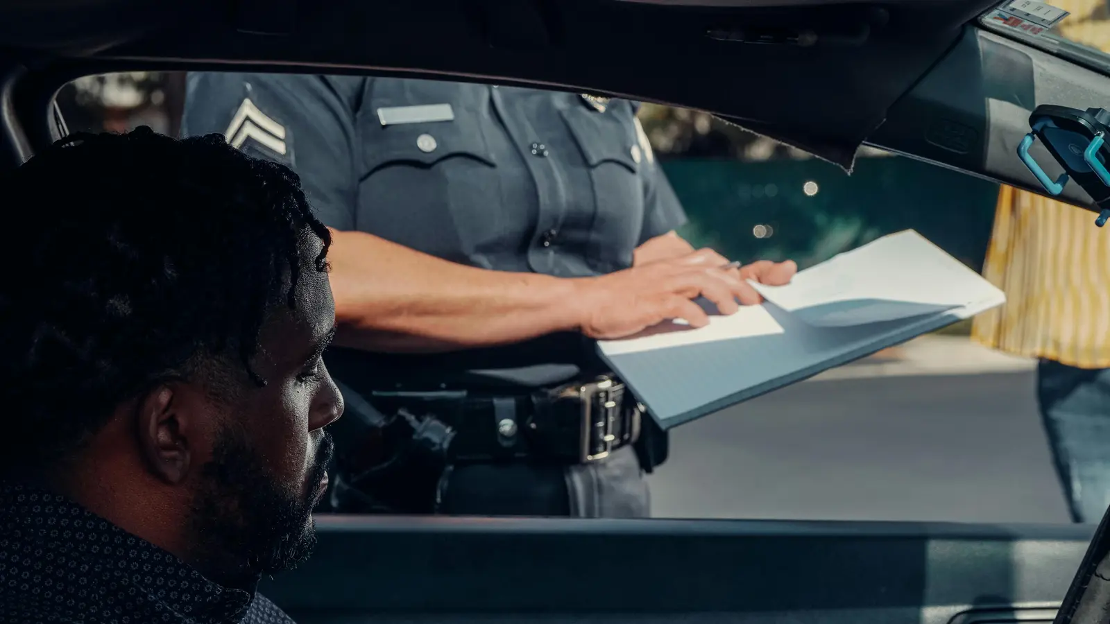 Police officer stopping driver representing DUI charge