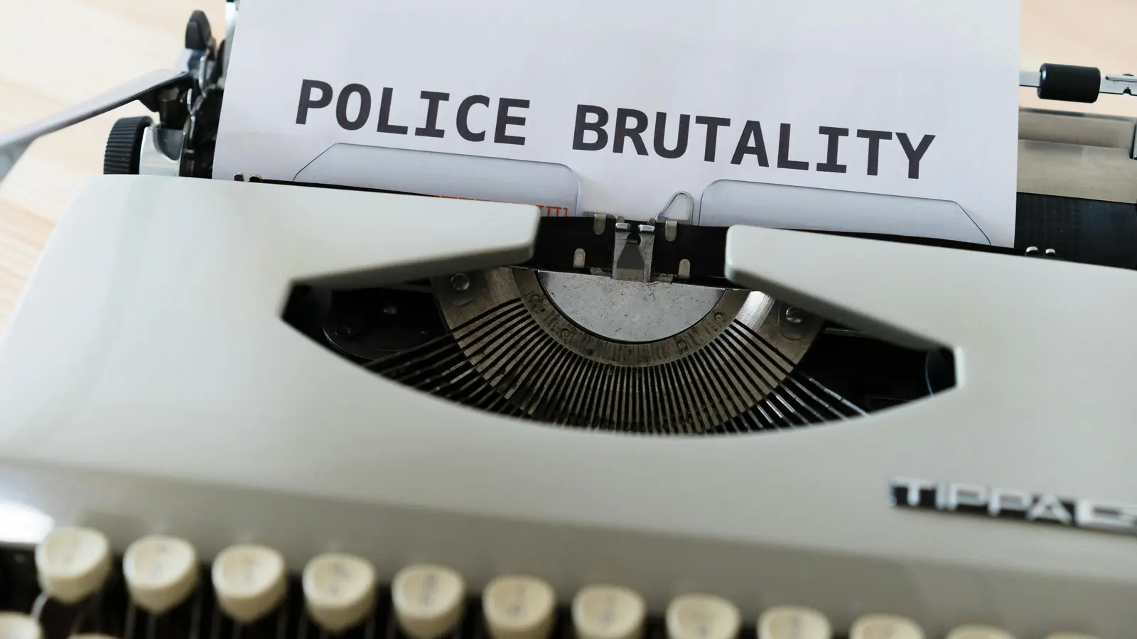 Typewriter with document representing defamation claim
