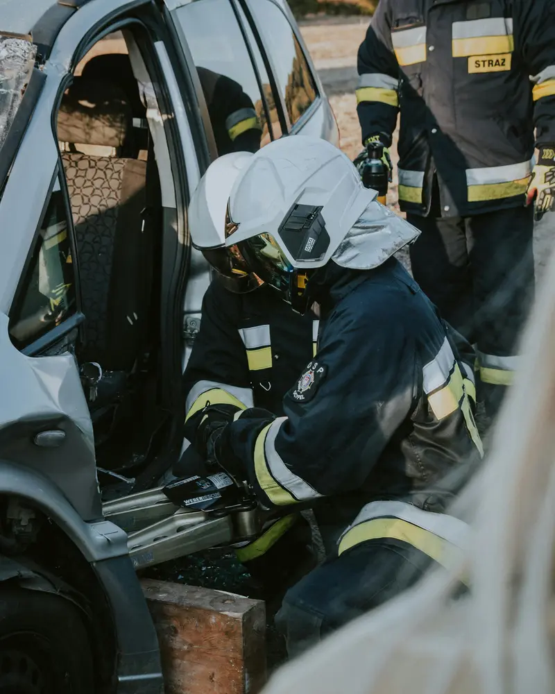 Emergency responders working at car accident scene