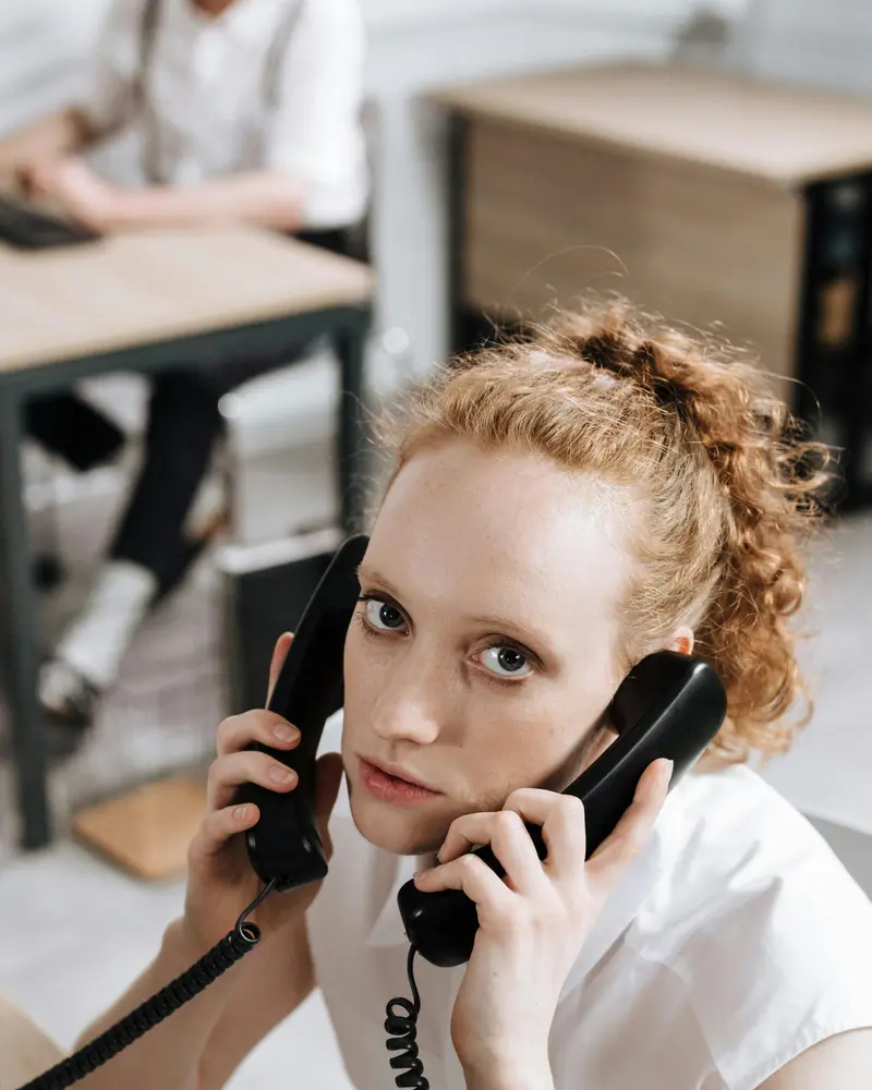 Person contacting bank and fraud team after identity theft in the UK