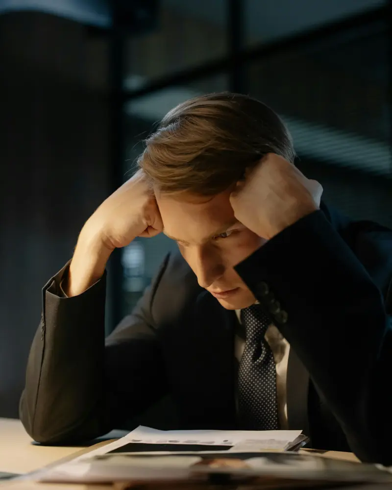 Business person managing a commercial dispute paperwork in England